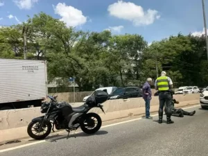 bystanders help a motorcycle crash victim
