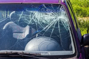 unlicensed driver causes car accident