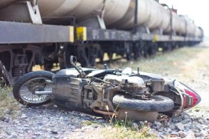 Truck crashes motorcycle.